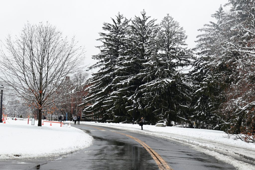 snow pile meltwater crossing sidewalk”