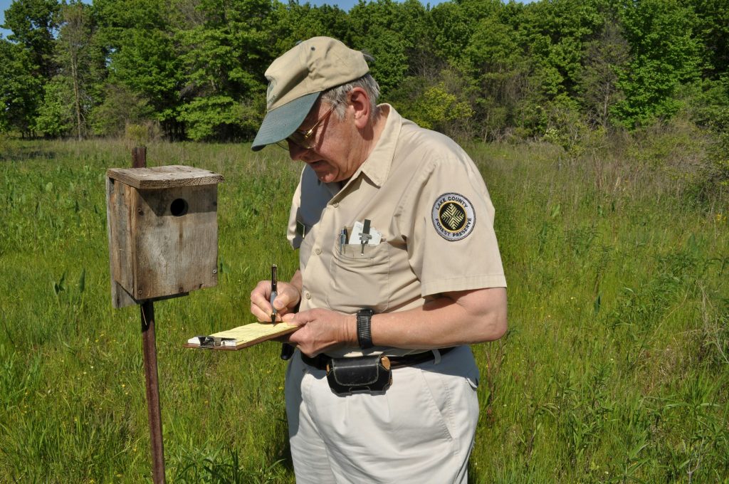 wildlife researcher mapping sightings